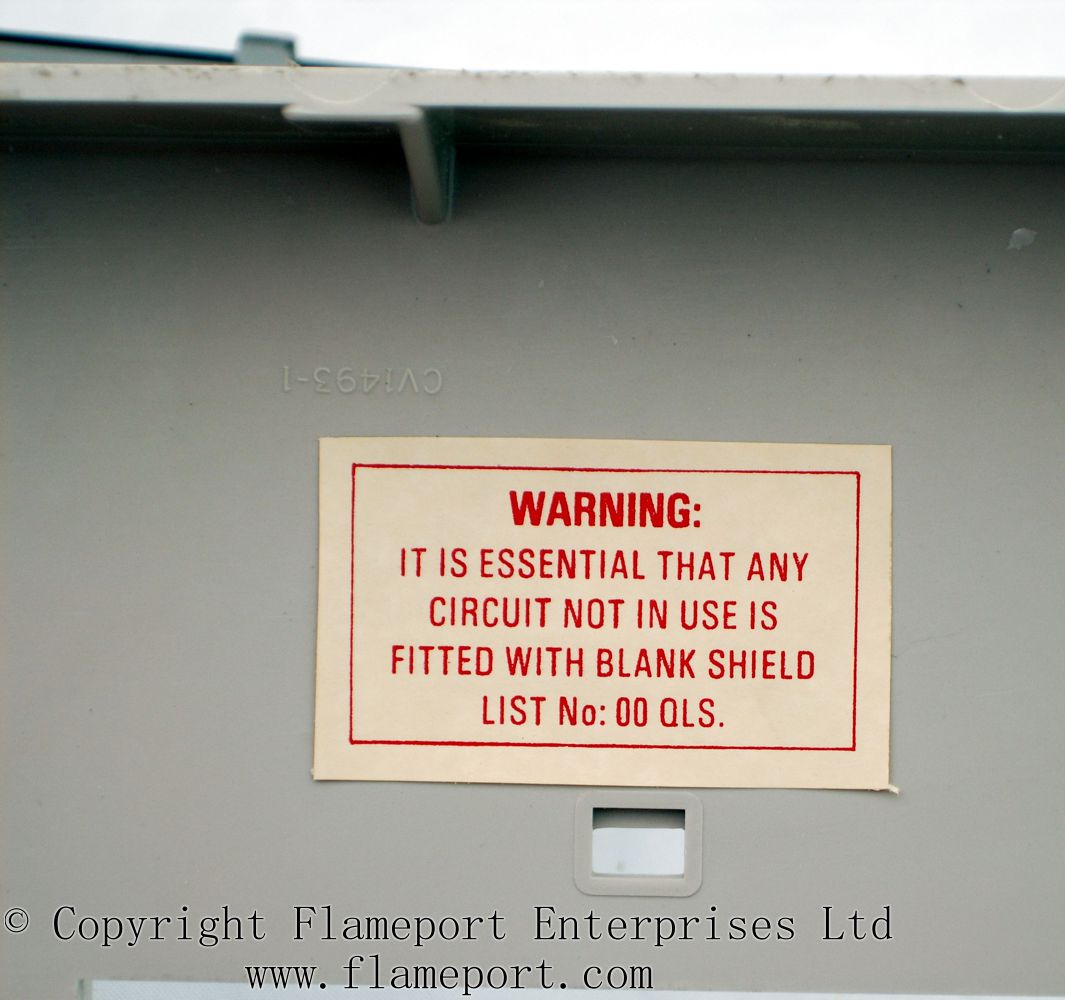 ... Warning label inside a MEMERA 3 fuse box