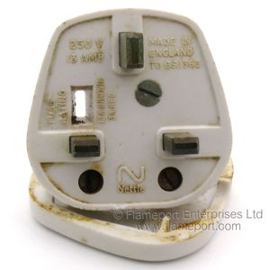 Pins and text on a white Nettle BS1363 three pin plug