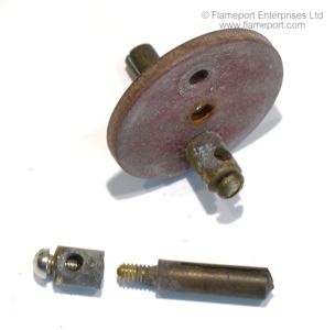 Terminals and fibre disc from a wooden electrical two pin plug