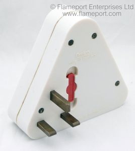 Back view of a triangular Grelco adaptor showing 13A plug pins and fuse holder