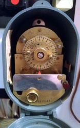 Venner timer with brass 24 hour dial in metal case, front open